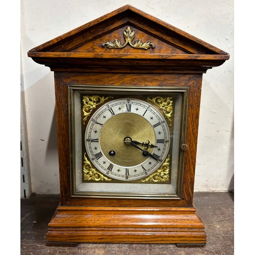 330 - An early 20th Century German oak bracket clock