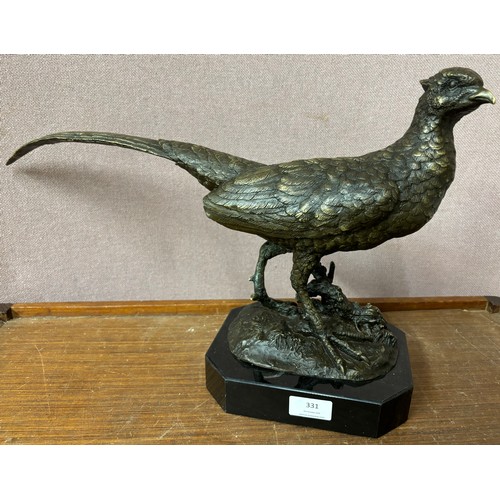 331 - A bronze figure of a pheasant, on black marble socle