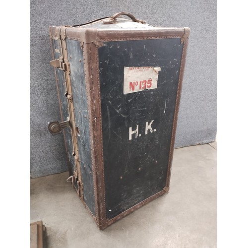 282 - An early 20th Century Innovation metal bound fitted travel trunk