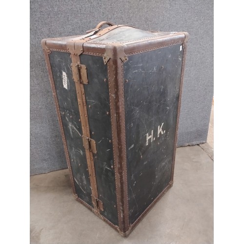 282 - An early 20th Century Innovation metal bound fitted travel trunk