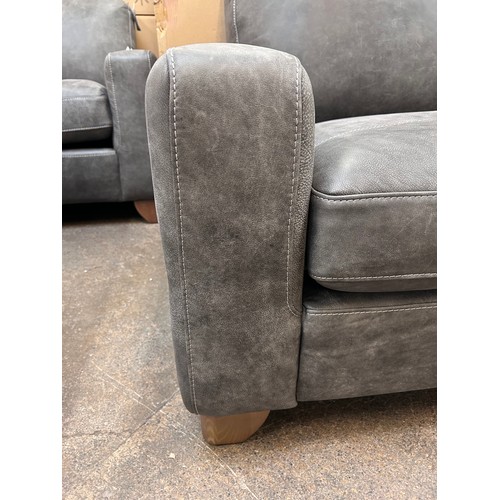 3116 - A Marco armchair in sanded charcoal *This lot is subject to VAT