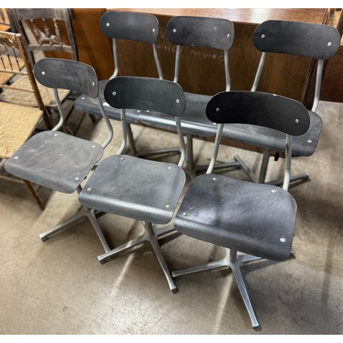 261 - A set of six Tansad black and tubular metal industrial machinist chairs