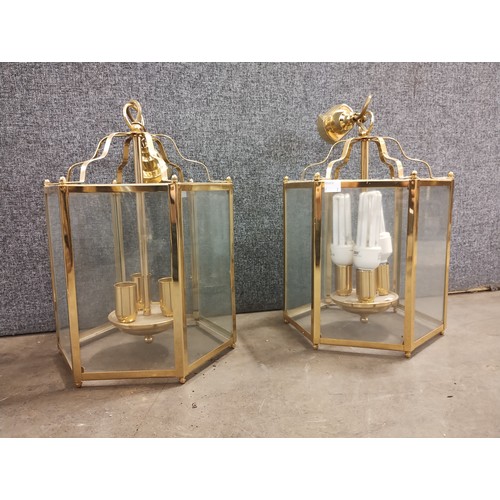 286 - A pair of brass ceiling lights