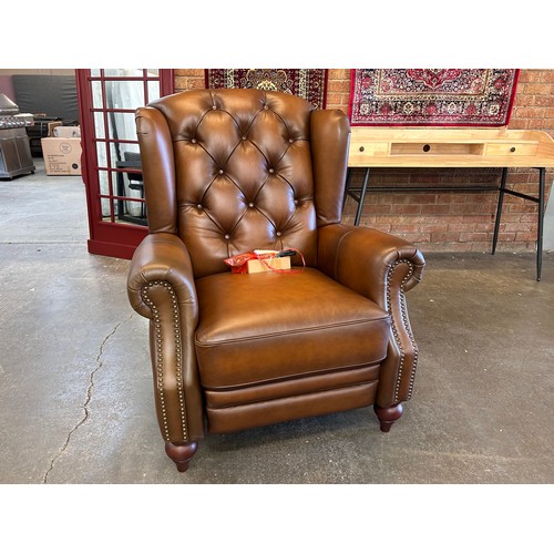 3128 - A Buckingham power reclining wing chair in vintage Tabuc *This lot is subject to VAT