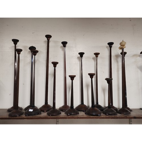 307 - Fourteen early 20th Century walnut & beech hat stands