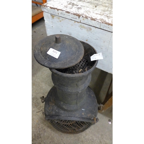 5221 - A cast metal solid fuel burning Chiminea