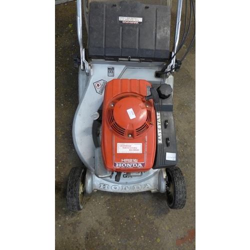 5234 - A Honda HR216 easy start petrol lawn mower - with new bearings