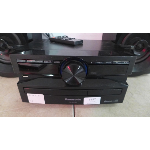 5157 - A Panasonic model SA-UX100 stereo system with a pair of matching stereo speakers