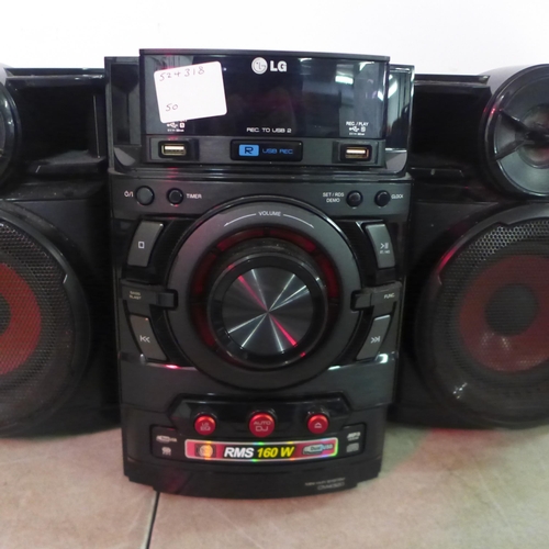 5162 - An LG CM4320 mini Hi-Fi stereo system and a pair of CMS432OF stereo speakers