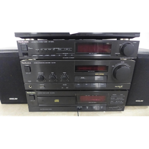 5153 - A quantity of Technics stereo equipment including an SL-J110R DC Servo automatic turntable system, a... 