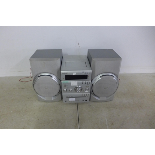 5167 - A Sony model HCD-GPZ6 compact disc receiver stereo system and a pair of Phillips Bass reflex stereo ... 