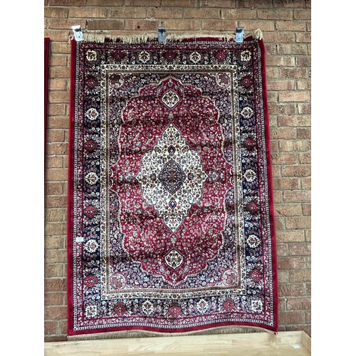 3125 - Rich red ground full pile cashmere rug, traditional medallion design 170 x 115