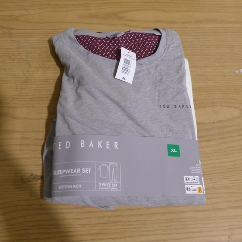 6220 - Quantity of mixed branded clothing, to include: Ted Baker, Levi's, Champion, Tommy Hilfiger, etc, va... 