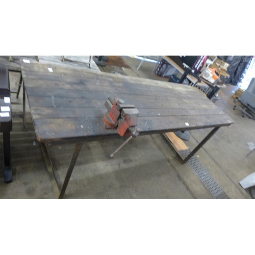 5236A - A 7ft x 2.5ft wooden workshop table with a steel frame and attached record No.74 auto vice