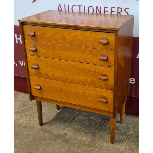 3 - A teak chest of drawers