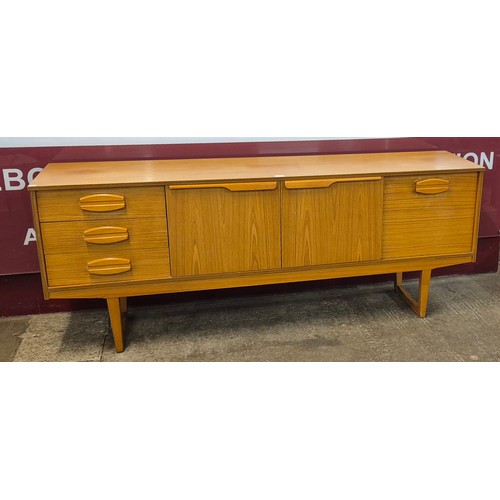 9 - A teak sideboard