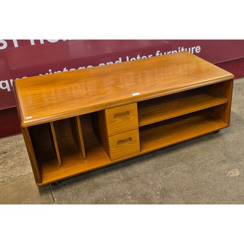 11 - A teak coffee table