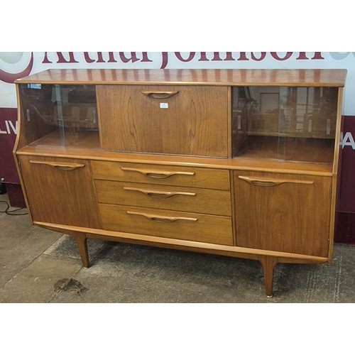 33 - A Jentique teak highboard