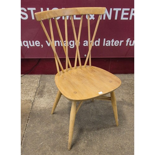 22A - A set of four Ercol Blonde elm and beech 376 model candlestick chairs