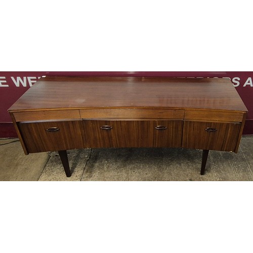 66 - An Elliotts of Newbury afromosia concave sideboard