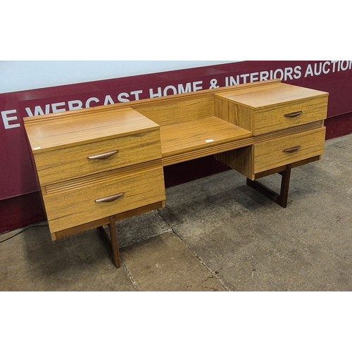 71 - A teak dressing table