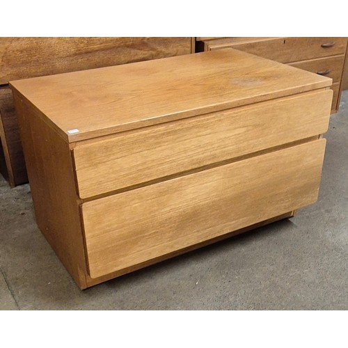 72 - A teak chest of drawers