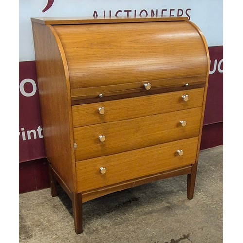 78 - A teak cylinder bureau