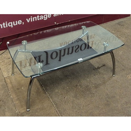 80 - A Space Age chrome and glass topped coffee table