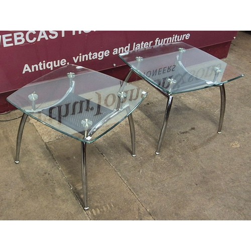 79 - A pair of Space Age chrome and glass topped coffee tables