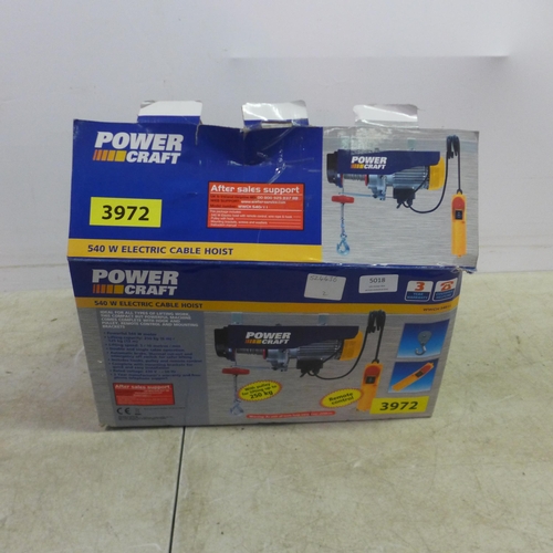 5018 - A Powercraft 540W electric cable hoist, in box