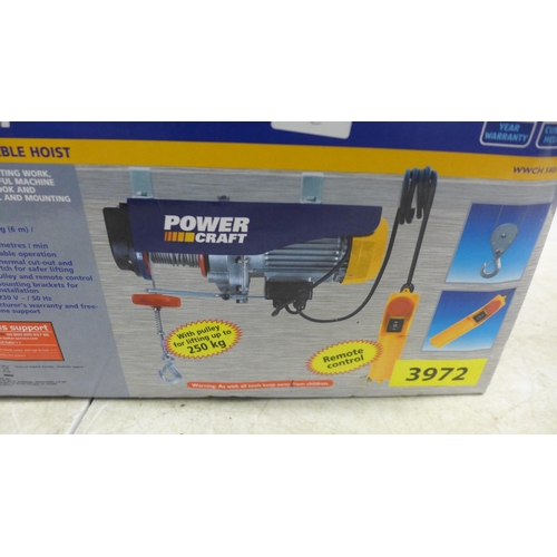 5018 - A Powercraft 540W electric cable hoist, in box