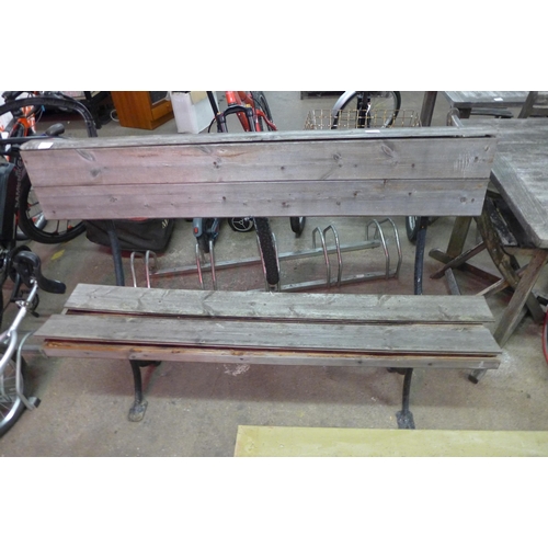 5126 - A wooden bench with cast iron frame