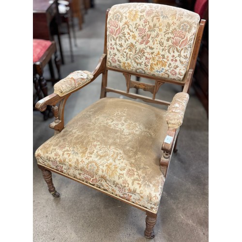 204 - An Edward VII inlaid rosewood and fabric upholstered open armchair