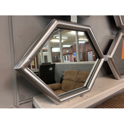 3010 - A silver metal framed mirror, 130cm