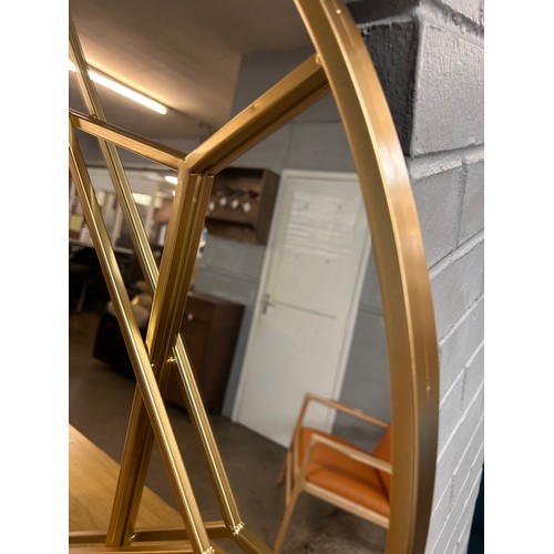 3073 - A gold metal framed round mirror, 80cm