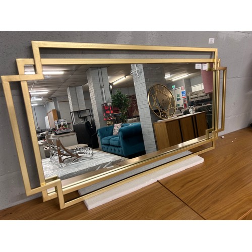 3077 - A gold metal framed Art Deco style mirror, 95 x 48cm