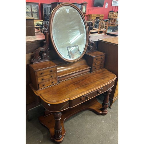 125 - A Victorian mahogany Duchess dressing table