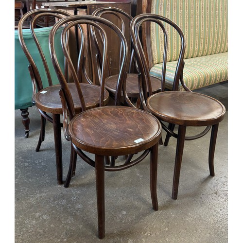 173 - A set of four early 20th Century beech bentwood chairs