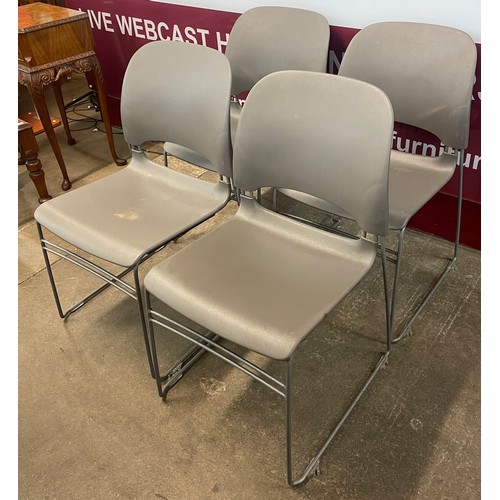 85A - A set of four Herman Miller grey plastic and tubular metal Limerick stacking chairs