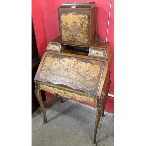 90 - A 19th Century French Louis XV style marquetry inlaid and ormolu mounted bureau de dame