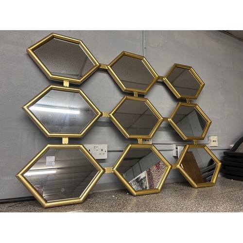 3154 - A gold metal framed mirror, 130cm