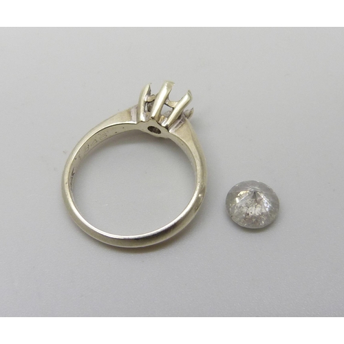 1003 - A 9ct white gold ring, claws a/f, 3g, with a loose diamond (a/f), diamond approximately 6mm