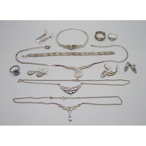 1008 - A collection of silver jewellery including a blue stone ring, necklaces and earrings, 63g