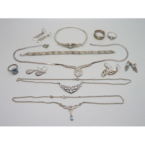 1008 - A collection of silver jewellery including a blue stone ring, necklaces and earrings, 63g