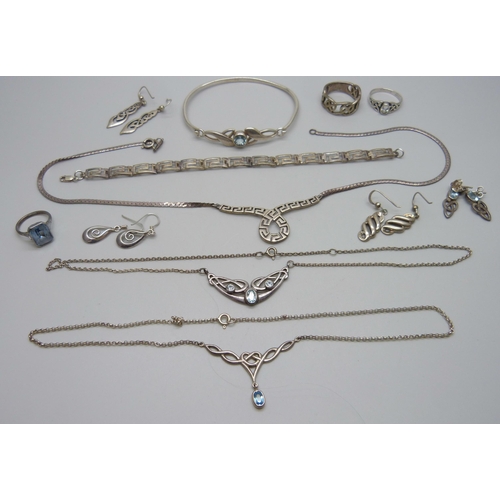 1008 - A collection of silver jewellery including a blue stone ring, necklaces and earrings, 63g