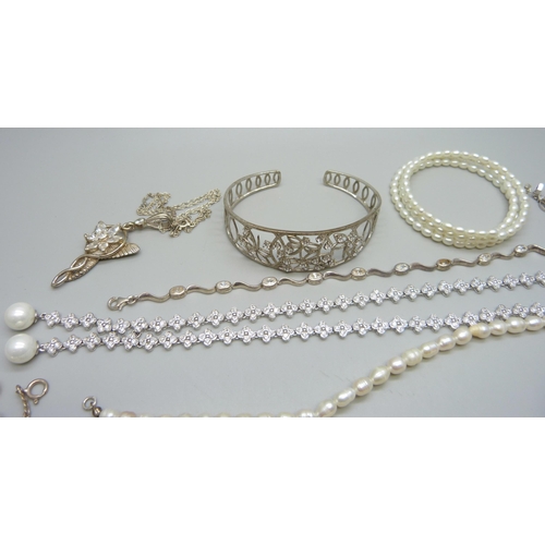 1015 - A collection of stone set silver jewellery, 78g, together with two strings of pearls (one clasp plat... 