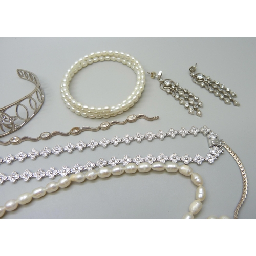 1015 - A collection of stone set silver jewellery, 78g, together with two strings of pearls (one clasp plat... 