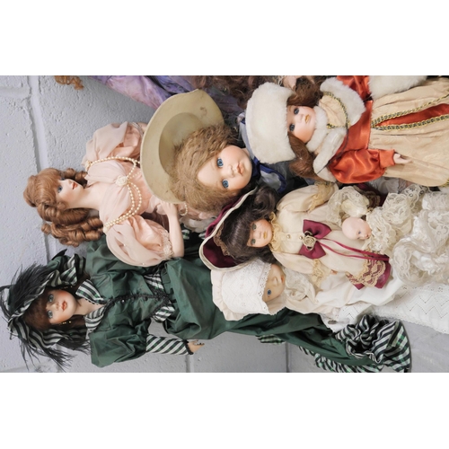 1036 - A large collection of costume dolls including some on stands, makes include Leonardo collection, FHD... 