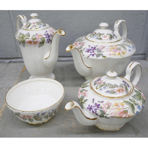 1039 - A collection of Paragon Country Lane including two teapots, coffee pot and sugar bowl **PLEASE NOTE ... 