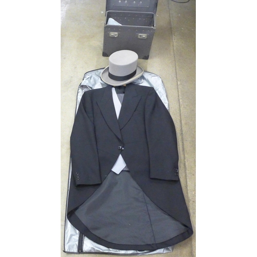 1058 - A morning suit with top hat, 7½, with case